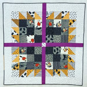 Enlarged Bear Paw Quilt featuring halloween themed fabrics